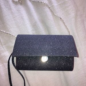Small black sparkle clutch